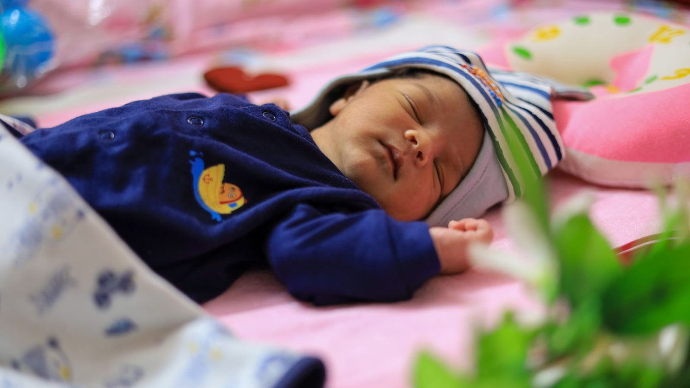 Baby sleeping in a crib