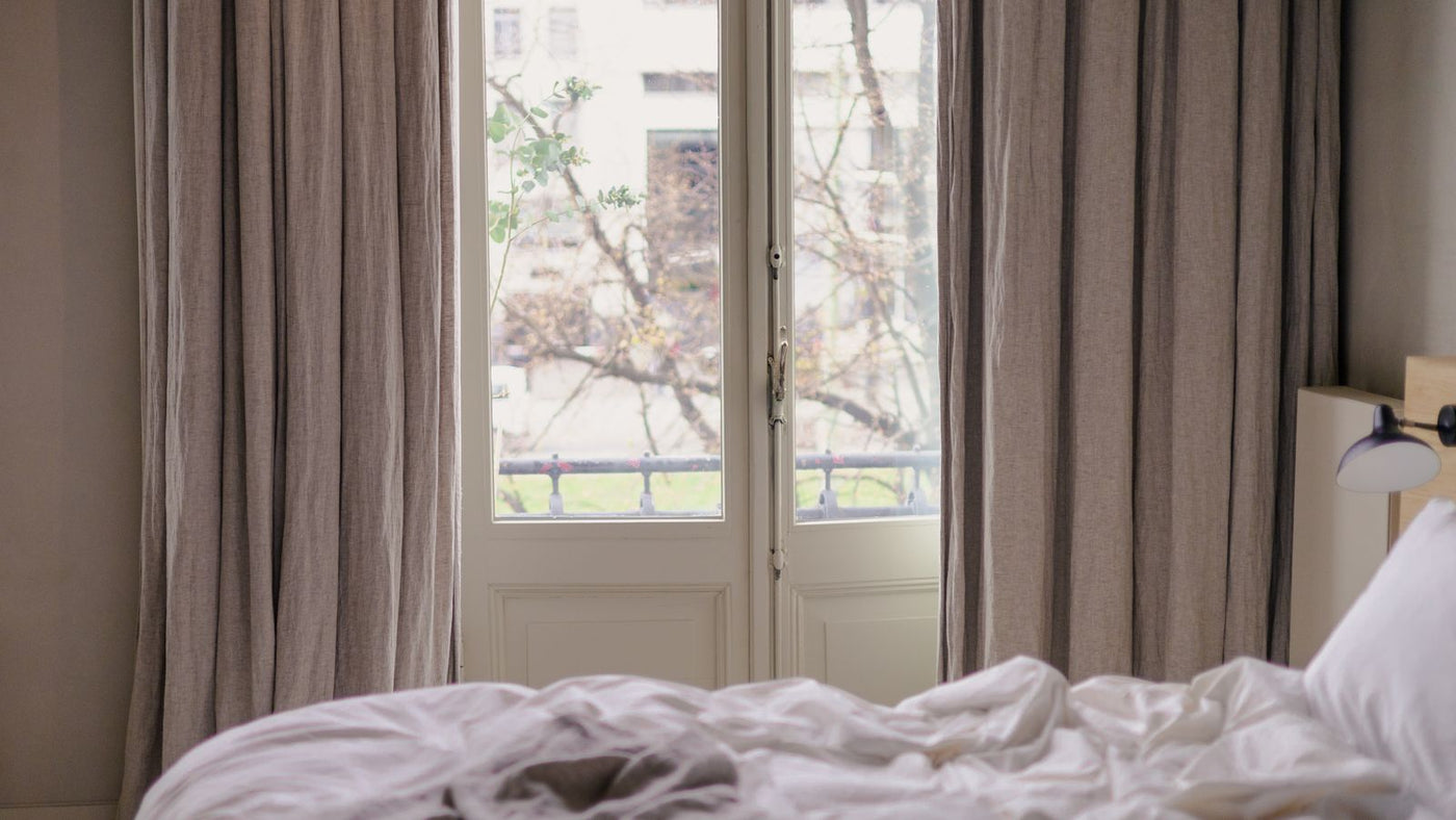 Blackout curtains in a bedroom window